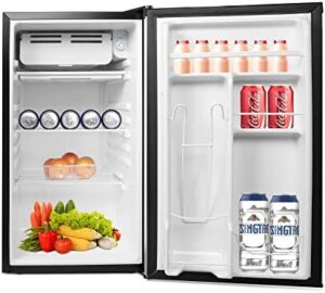 3.2 Cu.Ft. Mini Fridge with Freezer in a modern home setting, showcasing the reversible door and adjustable legs